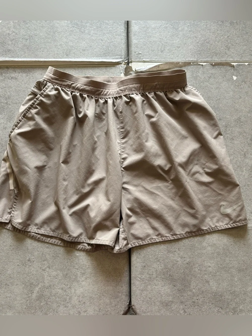 Tan nike running shorts